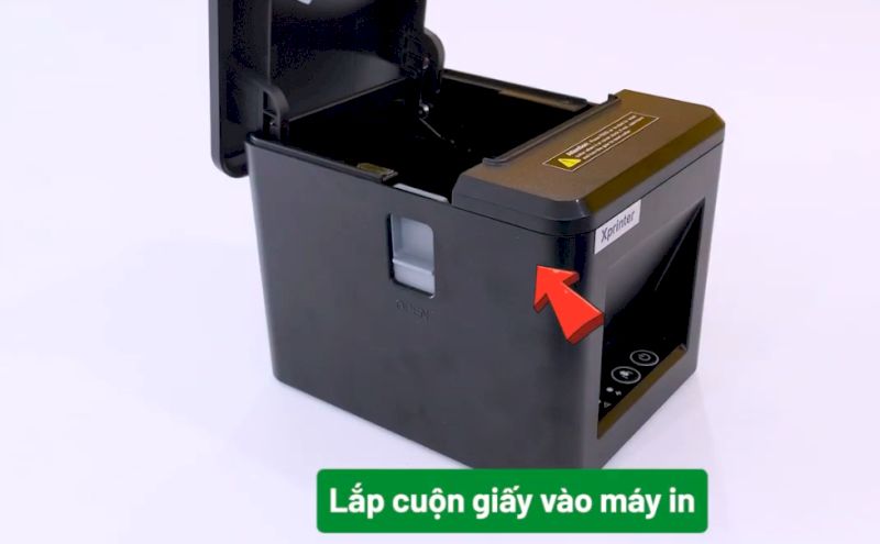 Lắp cuộn giấy vào máy in